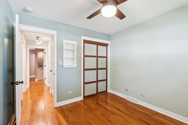 105 E Vermont St, Villa Park, IL 60181 - unfurnished bedroom with light wood-type flooring, a closet, and ceiling fan