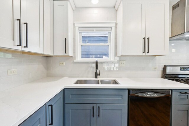 105 E Vermont St, Villa Park, IL 60181 - kitchen featuring dishwasher, ventilation hood, light countertops, and white cabinetry