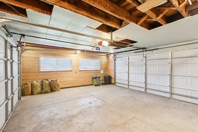 105 E Vermont St, Villa Park, IL 60181 - garage featuring a garage door opener and wood walls