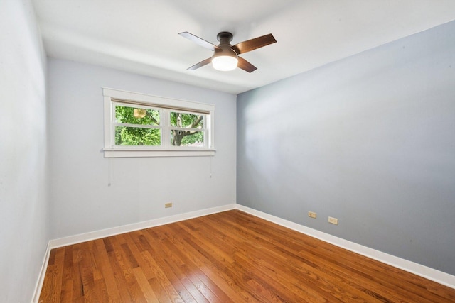 105 E Vermont St, Villa Park, IL 60181 - spare room featuring wood finished floors and ceiling fan