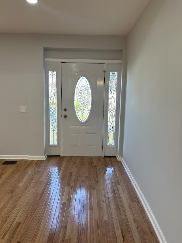 1122 N Mason Ave, Chicago, IL 60651 - entryway with wood finished floors and baseboards