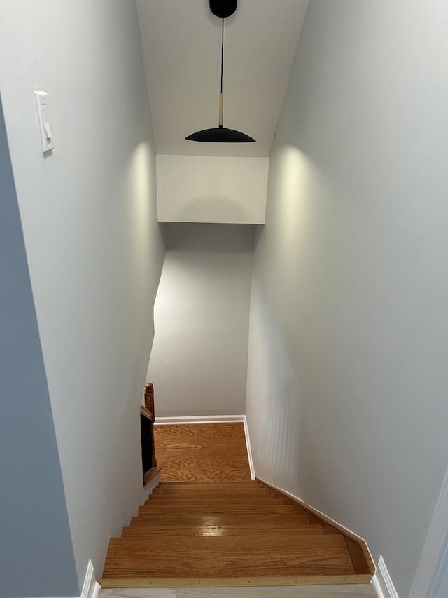 1122 N Mason Ave, Chicago, IL 60651 - stairs with wood finished floors and baseboards
