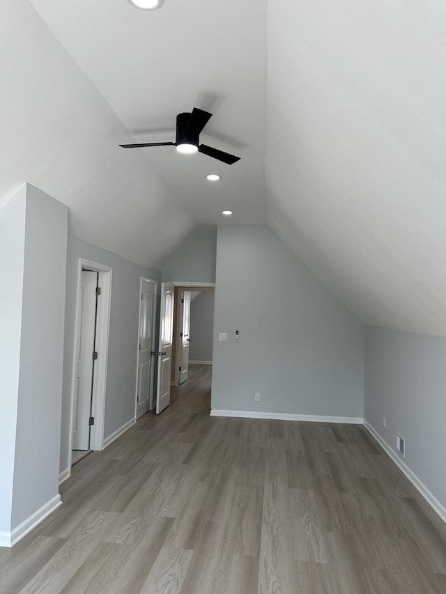 1122 N Mason Ave, Chicago, IL 60651 - additional living space with ceiling fan, wood finished floors, vaulted ceiling, and recessed lighting