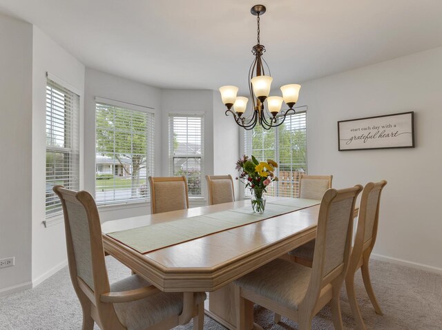 9312 Bristol Ln, Huntley, IL 60142 - dining room with carpet flooring and a chandelier