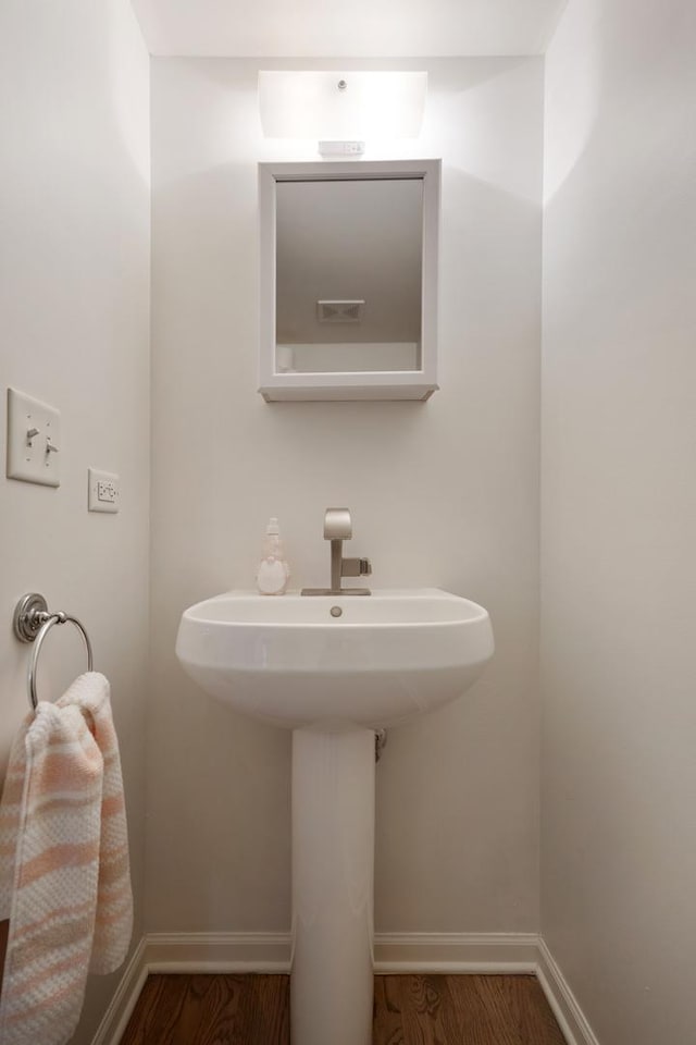 9312 Bristol Ln, Huntley, IL 60142 - bathroom with wood finished floors and baseboards
