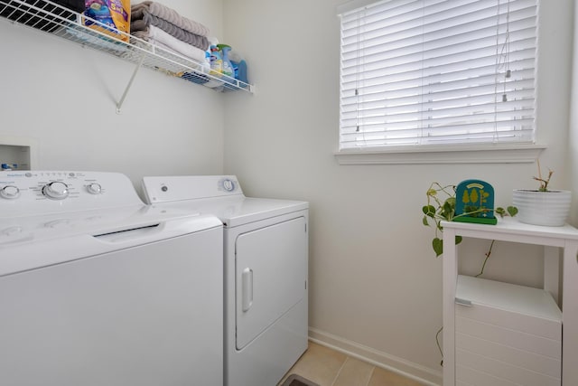 9312 Bristol Ln, Huntley, IL 60142 - laundry area featuring washing machine and clothes dryer and light tile patterned floors