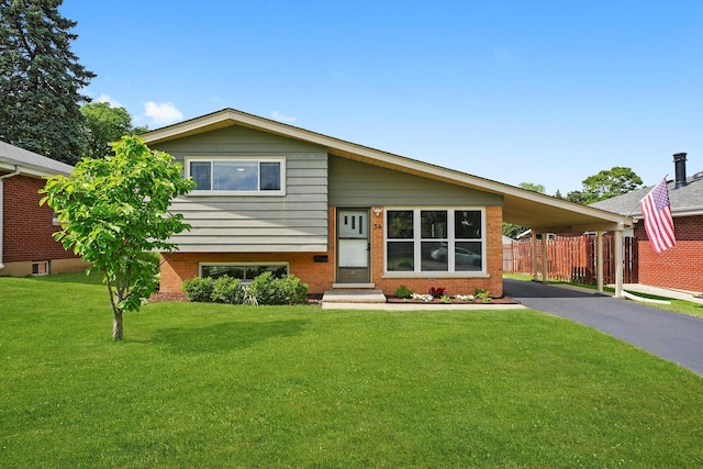 56 W Granville Ave, Roselle, IL 60172 - split level home featuring asphalt driveway, brick siding, and an attached carport