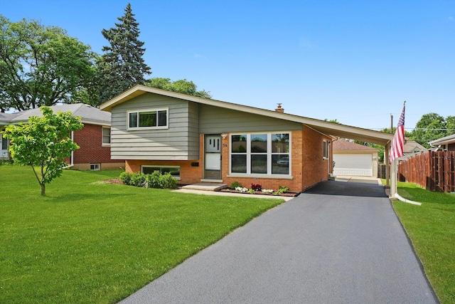 56 W Granville Ave, Roselle, IL 60172 - tri-level home with brick siding, an outdoor structure, and asphalt driveway