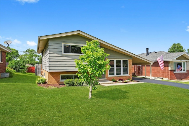 56 W Granville Ave, Roselle, IL 60172 - view of front of property featuring a carport and asphalt driveway