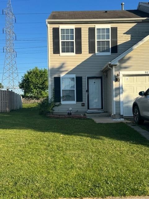 923 E Savannah Dr, Romeoville, IL 60446 - view of front facade with a garage