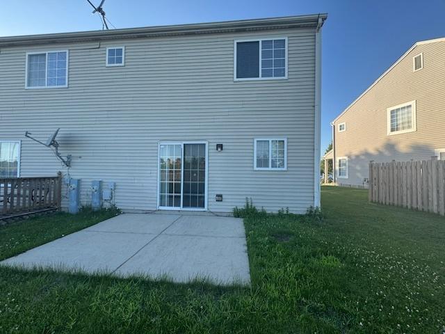 923 E Savannah Dr, Romeoville, IL 60446 - rear view of house with a patio