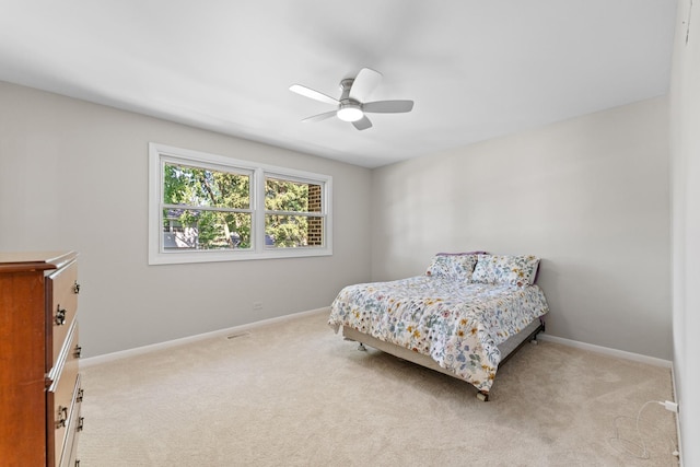 6S184 Lakewood Dr, Naperville, IL 60540 - carpeted bedroom with baseboards and a ceiling fan