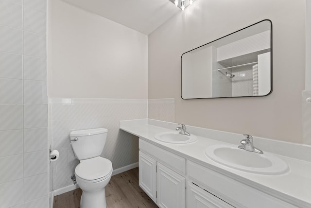 6S184 Lakewood Dr, Naperville, IL 60540 - full bath featuring wood finished floors, double vanity, a tile shower, and a wainscoted wall