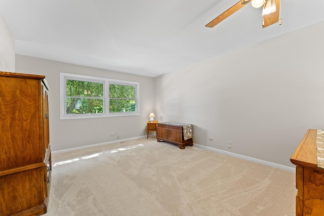 6S184 Lakewood Dr, Naperville, IL 60540 - unfurnished bedroom with light carpet and a ceiling fan