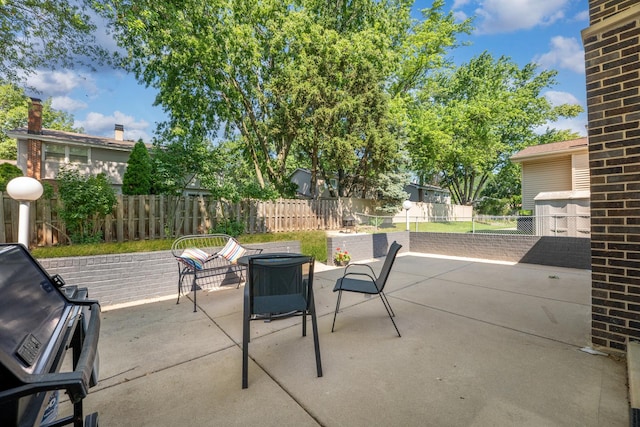 6S184 Lakewood Dr, Naperville, IL 60540 - fenced backyard featuring a patio