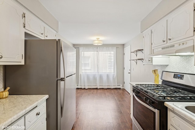 6839 N NW Hwy Unit 2B, Chicago, IL 60631 - kitchen featuring appliances with stainless steel finishes, under cabinet range hood, a baseboard radiator, backsplash, and white cabinets