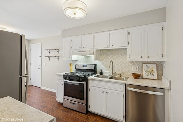 6839 N NW Hwy Unit 2B, Chicago, IL 60631 - kitchen with appliances with stainless steel finishes, under cabinet range hood, white cabinets, and dark wood finished floors