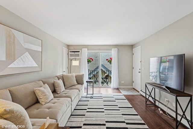 6839 N NW Hwy Unit 2B, Chicago, IL 60631 - living room featuring wood finished floors, baseboard heating, and a wall mounted AC