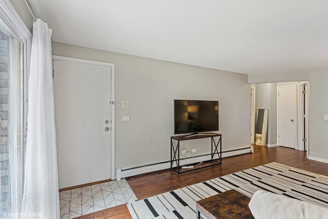 6839 N NW Hwy Unit 2B, Chicago, IL 60631 - living room with a baseboard radiator and wood finished floors