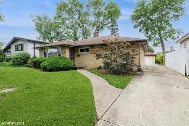 1036 Perda Ln, Des Plaines, IL 60016 - view of front of home featuring brick siding, a chimney, and a detached garage