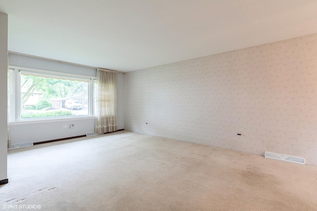1036 Perda Ln, Des Plaines, IL 60016 - carpeted spare room with wallpapered walls