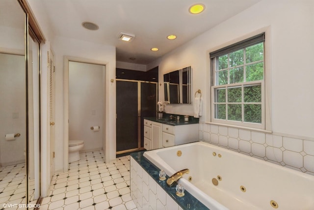 1076 Old Barn Ln, Lake Forest, IL 60045 - bathroom featuring a stall shower, a whirlpool tub, vanity, tile patterned floors, and recessed lighting