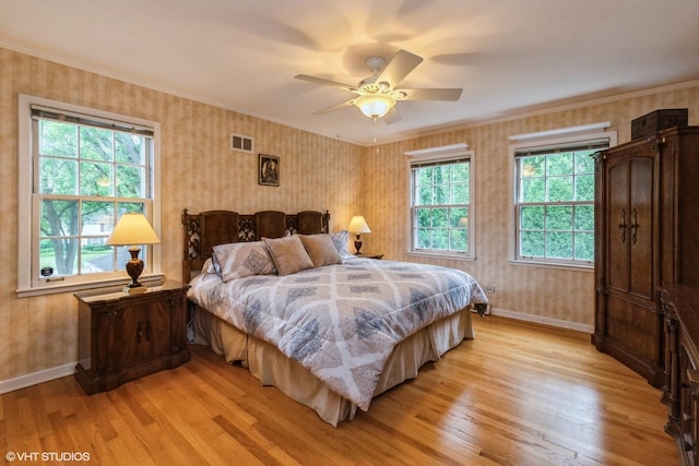 1076 Old Barn Ln, Lake Forest, IL 60045 - bedroom with light wood finished floors, wallpapered walls, crown molding, and a ceiling fan