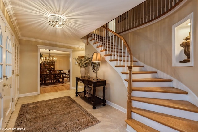 1076 Old Barn Ln, Lake Forest, IL 60045 - foyer with a chandelier, stairway, tile patterned flooring, and ornamental molding