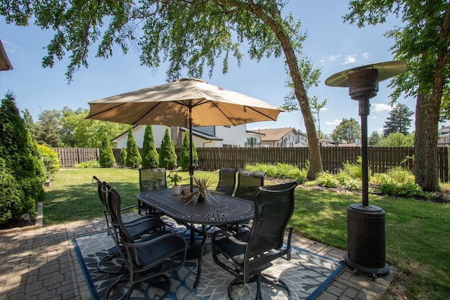 1148 N Anvil Ct, Addison, IL 60101 - fenced backyard with a patio and outdoor dining area