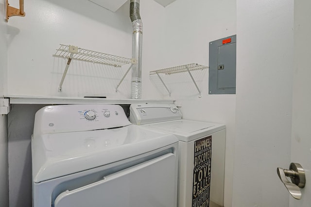 2354 S St Unit E, Elgin, IL 60123 - laundry room featuring electric panel and washer and dryer