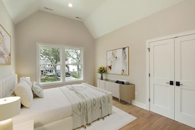 1947 Summerton Pl, Northbrook, IL 60062 - bedroom with light wood-type flooring, vaulted ceiling, and a closet