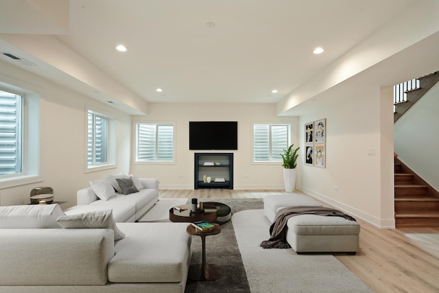 1947 Summerton Pl, Northbrook, IL 60062 - living area with light wood-style flooring, stairs, healthy amount of natural light, and recessed lighting