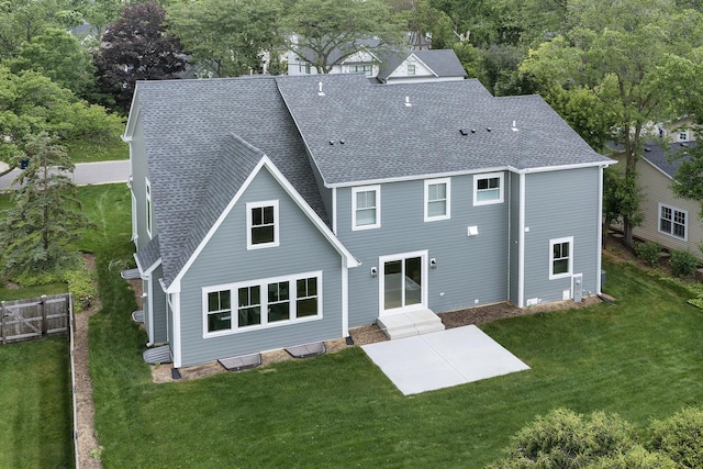 1947 Summerton Pl, Northbrook, IL 60062 - rear view of house with a shingled roof and a patio