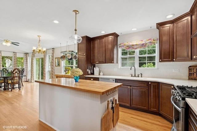 36917 N Deer Trail Dr, Lake Villa, IL 60046 - kitchen with wood counters, light wood-style floors, stainless steel appliances, a chandelier, and recessed lighting
