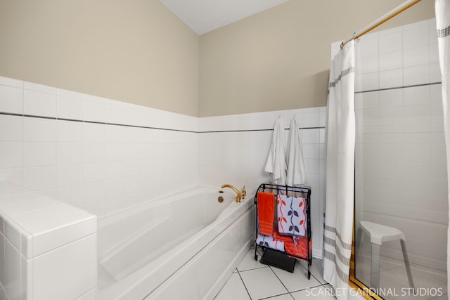 1500 S Ardmore Ave Unit 612, Villa Park, IL 60181 - full bathroom with a bath, a stall shower, tile patterned flooring, tile walls, and wainscoting