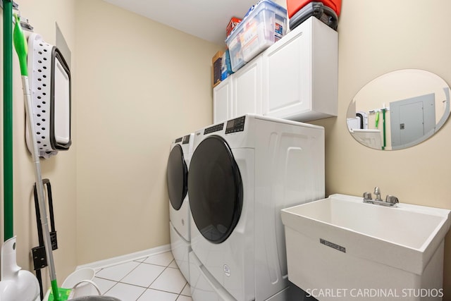 1500 S Ardmore Ave Unit 612, Villa Park, IL 60181 - laundry area with washer and clothes dryer, cabinet space, and light tile patterned floors