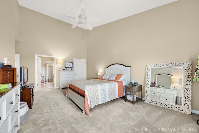 1500 S Ardmore Ave Unit 612, Villa Park, IL 60181 - bedroom featuring a towering ceiling, light colored carpet, ceiling fan, and connected bathroom