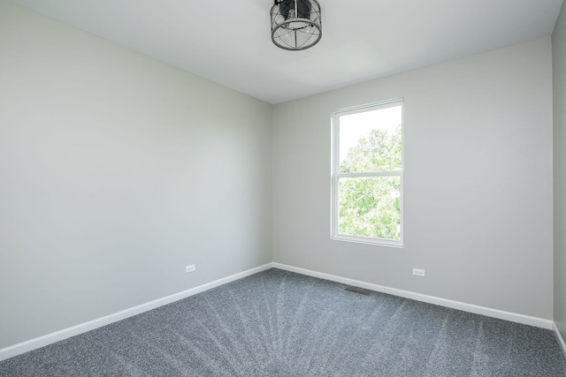 635 Conservatory Ln Unit 635, Aurora, IL 60502 - empty room with dark carpet and baseboards