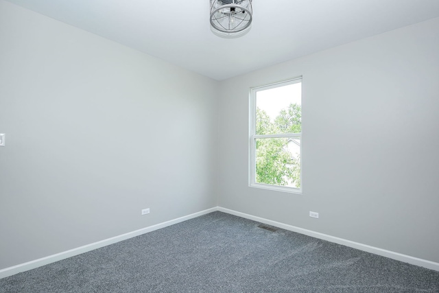 635 Conservatory Ln Unit 635, Aurora, IL 60502 - empty room with baseboards and dark colored carpet