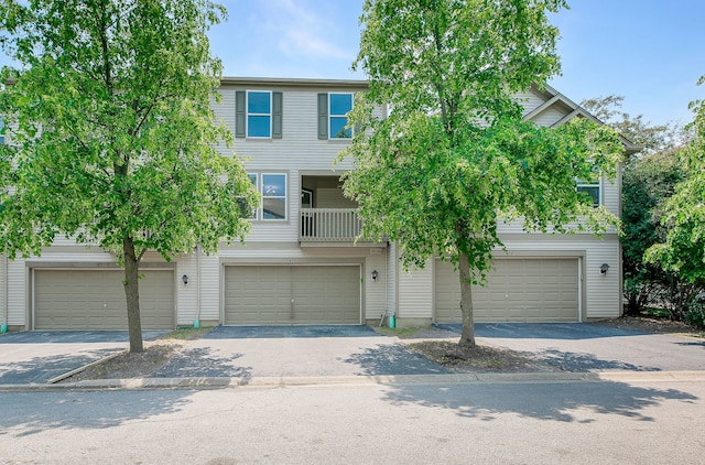 635 Conservatory Ln Unit 635, Aurora, IL 60502 - view of property featuring an attached garage and driveway