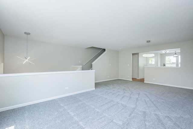 635 Conservatory Ln Unit 635, Aurora, IL 60502 - unfurnished living room with carpet flooring and baseboards