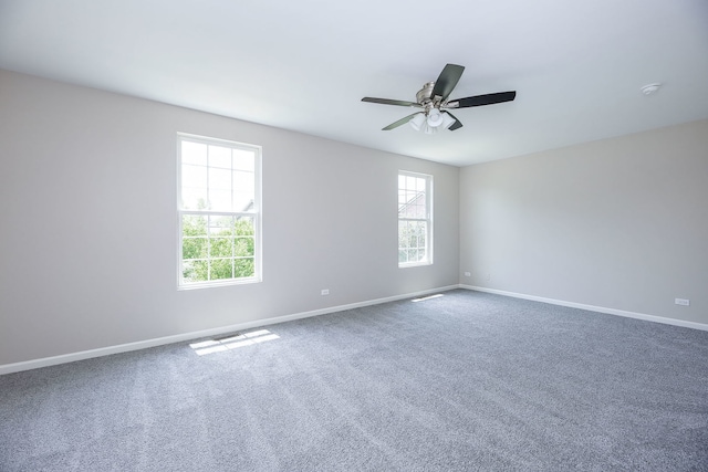 635 Conservatory Ln Unit 635, Aurora, IL 60502 - carpeted spare room with plenty of natural light, a ceiling fan, and a smoke detector