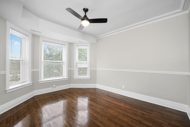 7548 S Harvard Ave, Chicago, IL 60620 - empty room featuring wood finished floors, healthy amount of natural light, a ceiling fan, and crown molding