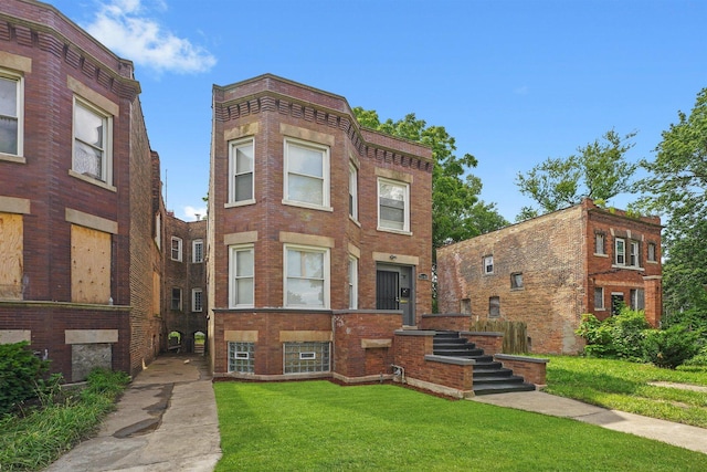 7548 S Harvard Ave, Chicago, IL 60620 - view of front of house with a front yard and brick siding