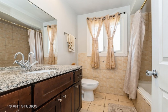 8036 S Fawn Trl, Justice, IL 60458 - full bath featuring tile walls, vanity, tile patterned flooring, and tiled shower / bath