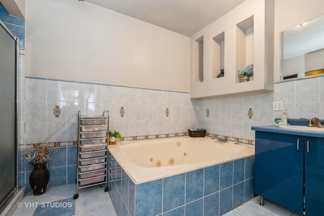 8036 S Fawn Trl, Justice, IL 60458 - full bathroom with tile patterned flooring, a tub with jets, vanity, a shower stall, and tile walls