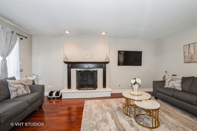 8036 S Fawn Trl, Justice, IL 60458 - living room with wood finished floors, a fireplace with raised hearth, and recessed lighting