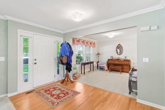 305 Buckingham Dr, Algonquin, IL 60102 - foyer with wood finished floors and ornamental molding