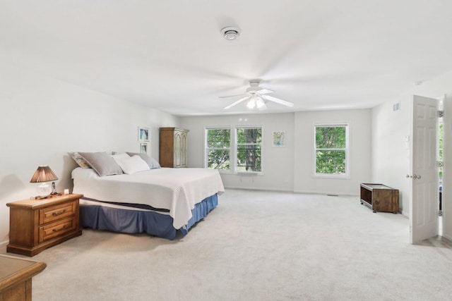 305 Buckingham Dr, Algonquin, IL 60102 - bedroom with light carpet and a ceiling fan