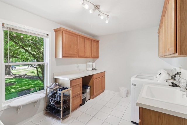 305 Buckingham Dr, Algonquin, IL 60102 - washroom with cabinet space, washing machine and clothes dryer, light tile patterned floors, and rail lighting